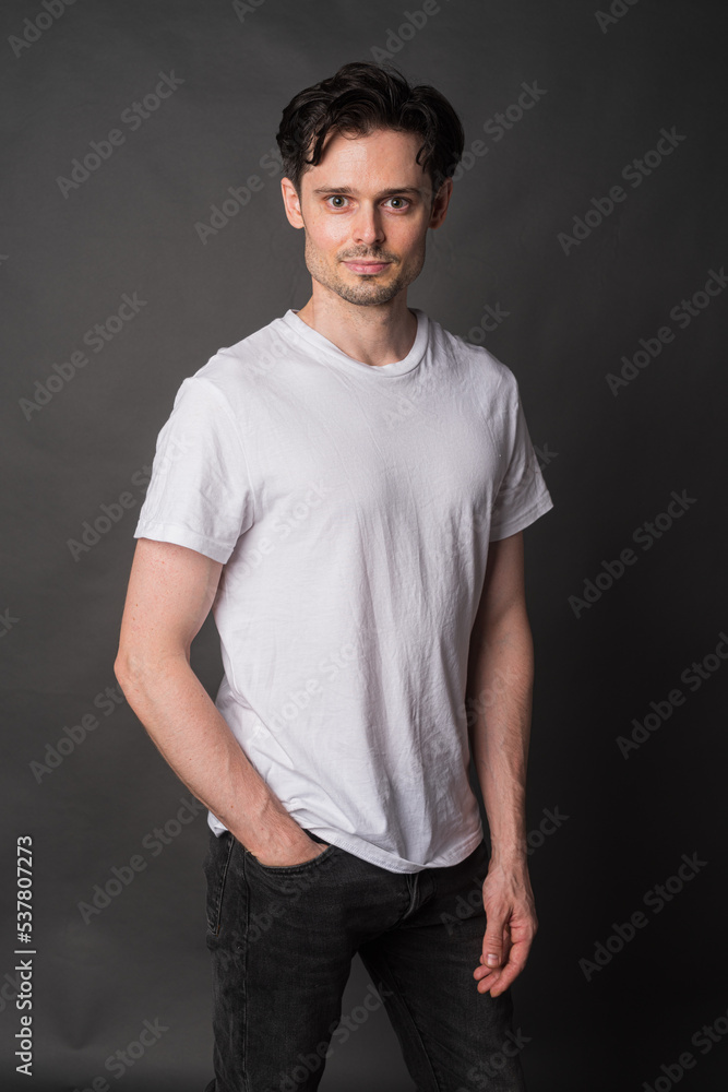 Studio portrait of handsome man against gray background Studio portrait of handsome man against gray background