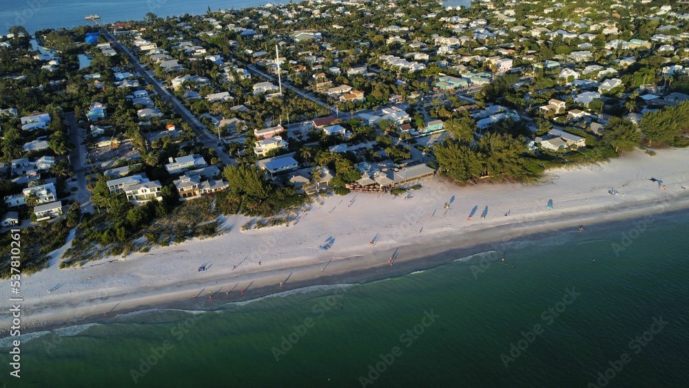 Fototapeta premium Aerial view of the coastline in Rehoboth Beach occupied by small buildings
