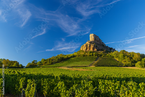 Rock of Solutre with vineyards, Burgundy, Solutre-Pouilly, France photo