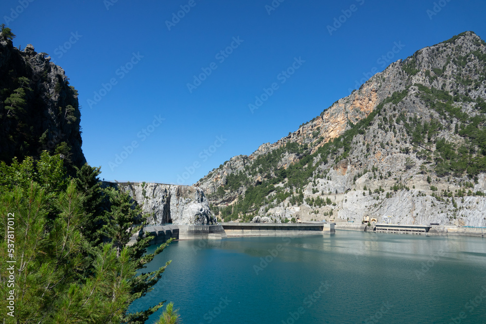 View of the lake and mountain cliffs in the area of the Oimapinar dam. Landscape of Green canyon, Manavgat, Antalya, Turkey