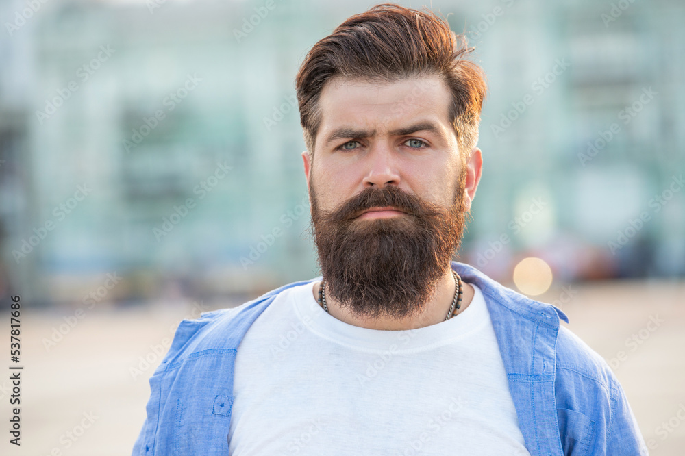 bearded man walk outside. face of man with beard. brutal casual man outdoor bearded man walk outside. face of man with beard. brutal casual man outdoor