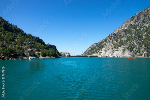 View of the lake and mountain cliffs in the area of the Oimapinar dam. Landscape of Green canyon, Manavgat, Antalya, Turkey