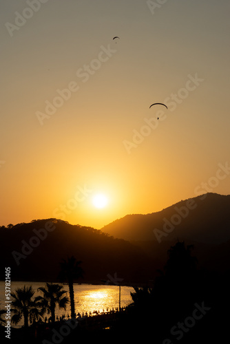Beautiful sunset at Oludeniz while paragliding, Turkey
