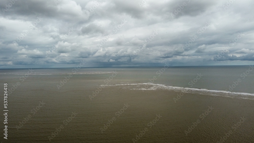 Aerial view of  storm clouds  over the sea. Taken on the Suffolk coast in England. 
