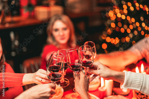 A family celebrating christmas holiday together in the comfort of their home.