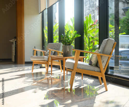 Interior of a modern hotel lounge cafe bar restaurant with beautiful sunlight.