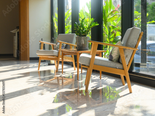 Interior of a modern hotel lounge cafe bar restaurant with beautiful sunlight.
