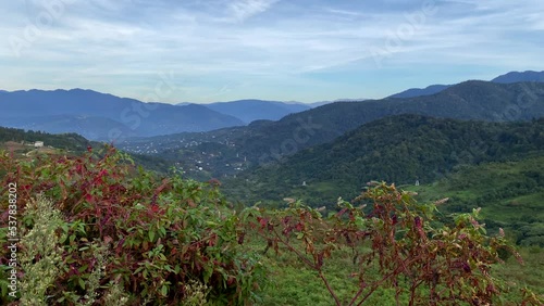 Mountains aesthetic panorama view from above. Peak of Gonio mountain in Adjara, Georgia. Blue sky with clouds