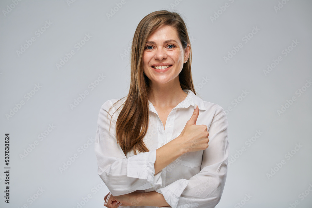 Portrait of smiling woman showing thumb up. Girl with big wide smile. Portrait of smiling woman showing thumb up. Girl with big wide smile.