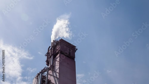 Stary Oskol, Russia - May 21, 2021: Smoke from a chimney photo