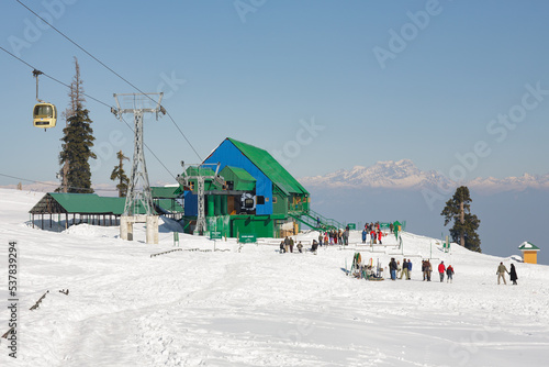 GULMARG SKI RESORT, KASHMIR, INDIA: Indian tourists skiing in Kongdoori, first station of the Gondola cable car, altitude 3090 meters photo