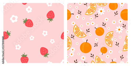 Seamless pattern with strawberries and daisy flower on pink backgrounds vector illustration. Seamless pattern with orange fruit and branches on pink background vector illustration.