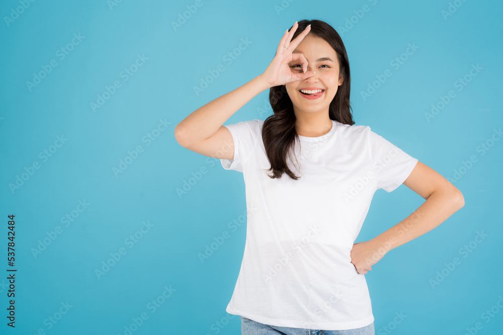 Beautiful Asian woman standing doing various poses. Beautiful Asian woman standing doing various poses.