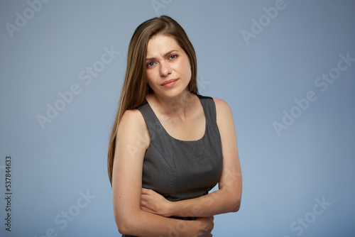 Woman with stomach pain. isolated portrait. Digestive disease concept.