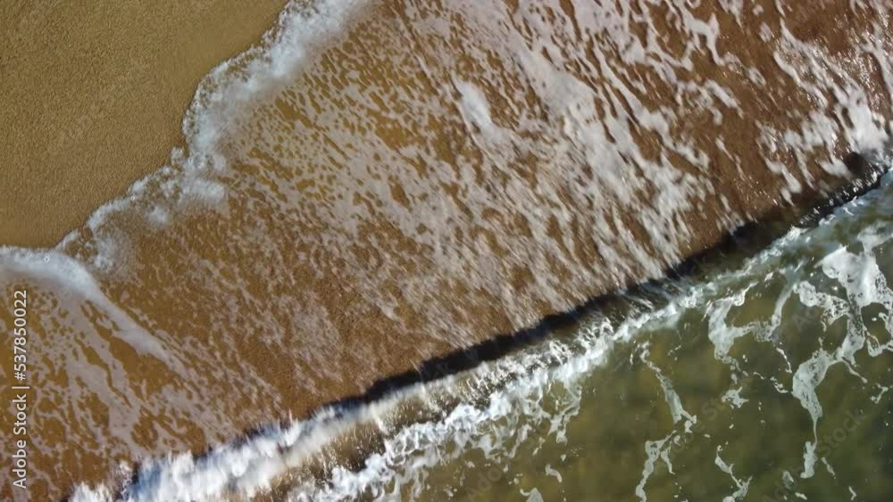 Dreamy spinning spiral over little waves on Mission Beach Queensland Dreamy spinning spiral over little waves on Mission Beach Queensland