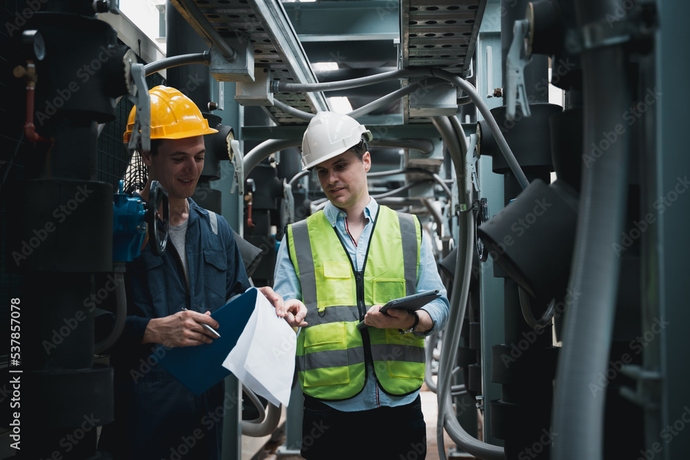 custom made wallpaper toronto digitalEngineer and team examining the air conditioning cooling system of a huge building or industrial site.