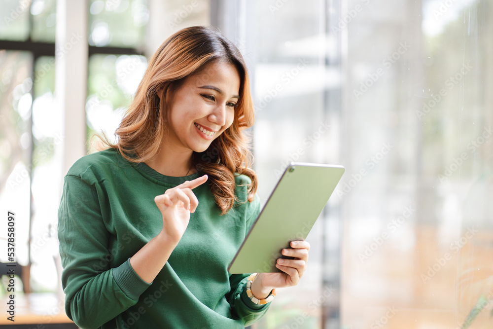 Portrait of an Asian woman holding a smartphone, typing messages, chatting with friends. on social networks mobile application concept Shopping online, browsing the web, ordering food Portrait of an Asian woman holding a smartphone, typing messages, chatting with friends. on social networks mobile application concept Shopping online, browsing the web, ordering food