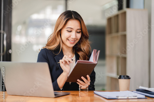 Asian business woman Business document check, account check, document search Legal documents, document preparation, reports, tax analysis, time, accounting, data sheets