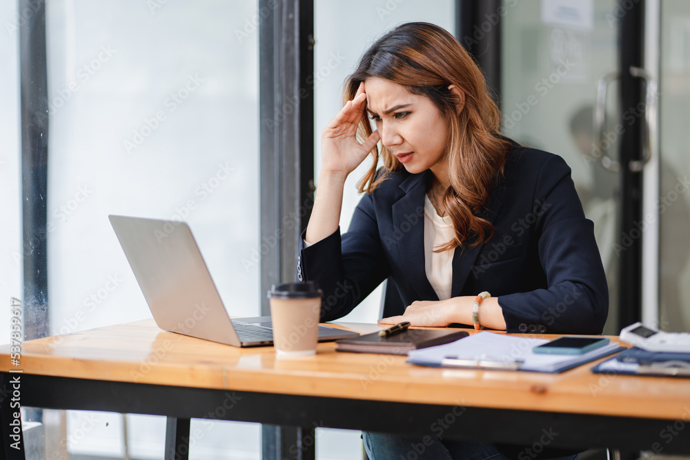 stressed asian woman The project failed, worried, hopeless, confused, exhausted. stressed asian woman The project failed, worried, hopeless, confused, exhausted.