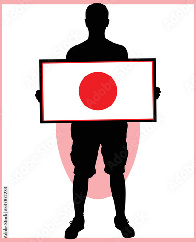 man holding a flag of Japan