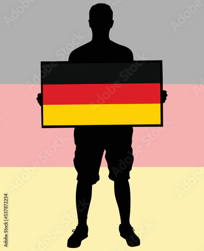 man holding a flag of Germany