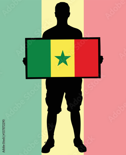 man holding a flag of Cameroon