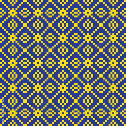 Yellow cross-stitch knitting pattern on blue background. Yellow square dots on blue backdrop. Fabric pattern design for sale. Knitting handicraft art.