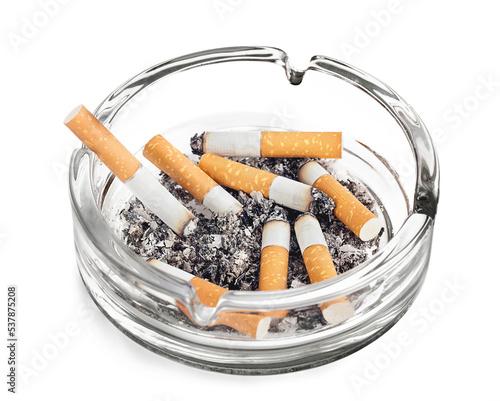 Burning cigarettes in ashtray on white background photo