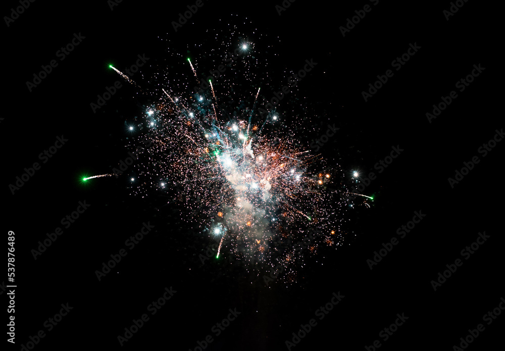 Obraz premium Bright and colorful firework explisions at a black night