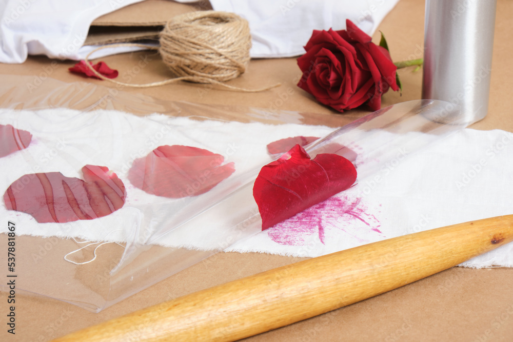 eco printing concept, rose petals to create a print with your own hands eco printing concept, rose petals to create a print with your own hands
