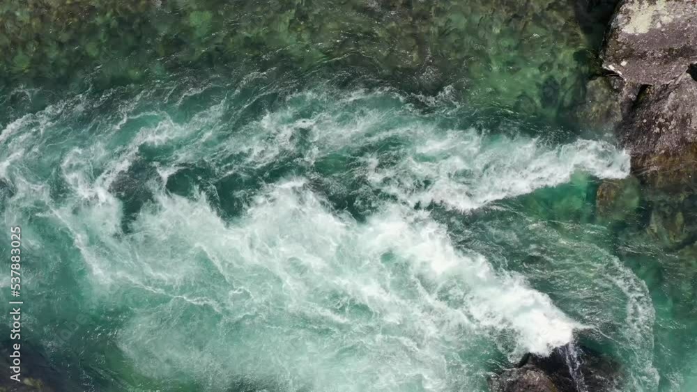 Aerial topdown view of powerful ocean current forming whirlpools and eddies, Aerial topdown view of powerful ocean current forming whirlpools and eddies,