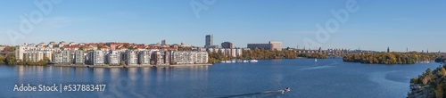 Panorama view, the Lux district, island Lilla Essingen, office and skyscrapers, bridge Västerbron the district Södermalm, the lake Mälaren. sunny a color full autumn day in Stockholm
