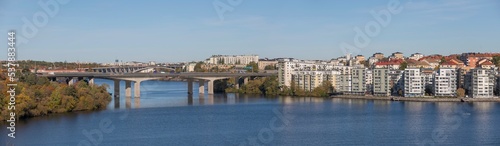 Panorama over the Essingen islands and the motorway bridges of Essingeleden and Traneberg, a bay in the lake Mälaren a sunny a color full autumn day in Stockholm