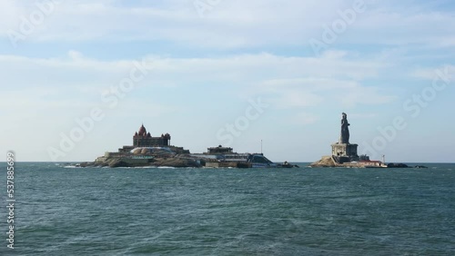 Vivekananda rock memorial and Thiruvalluvar statue near sea at Kanyakumari Tamilnadu South India 4k video footage	 photo