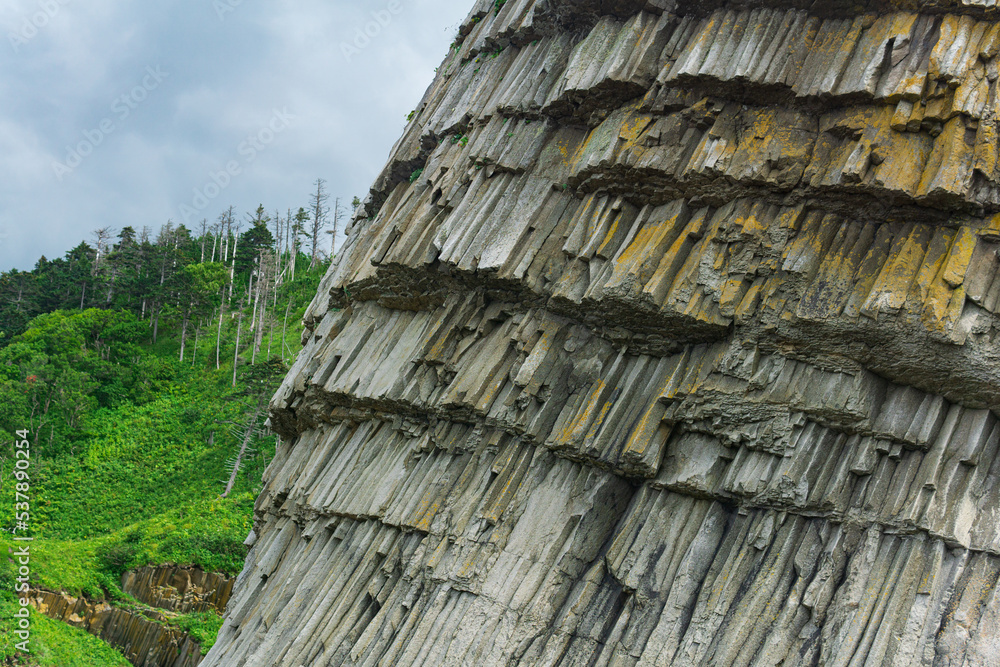 Naklejka premium natural background, rock fragment from volcanic lava pillars