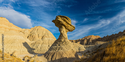 Toadstool Rock and The Peaks of Norbeck Pass, Badlands National Park, South Dakota, USA photo