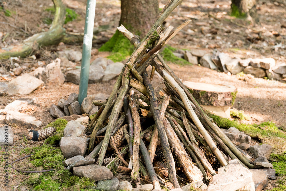 Piled up wood in a fireplace Piled up wood in a fireplace