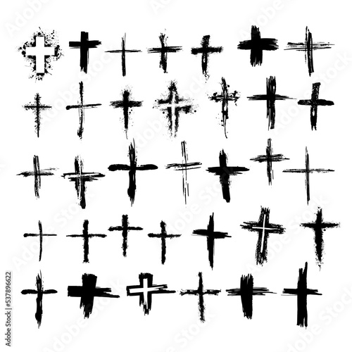 A set of crosses with a brush and blots. Vector illustration