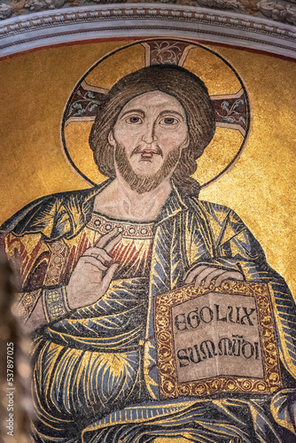 Close-up on golden fresco portraiting Jesus Christ