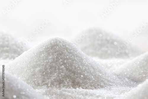 Sugar hills close-up. Refined white sugar in the kitchen