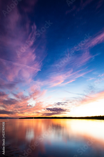 Colorful sunset and reflection at Bruce Peninsula National Park, Singing Sands Beach Tobermory