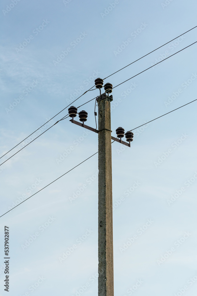 electric pole with wires against the sky electric pole with wires against the sky