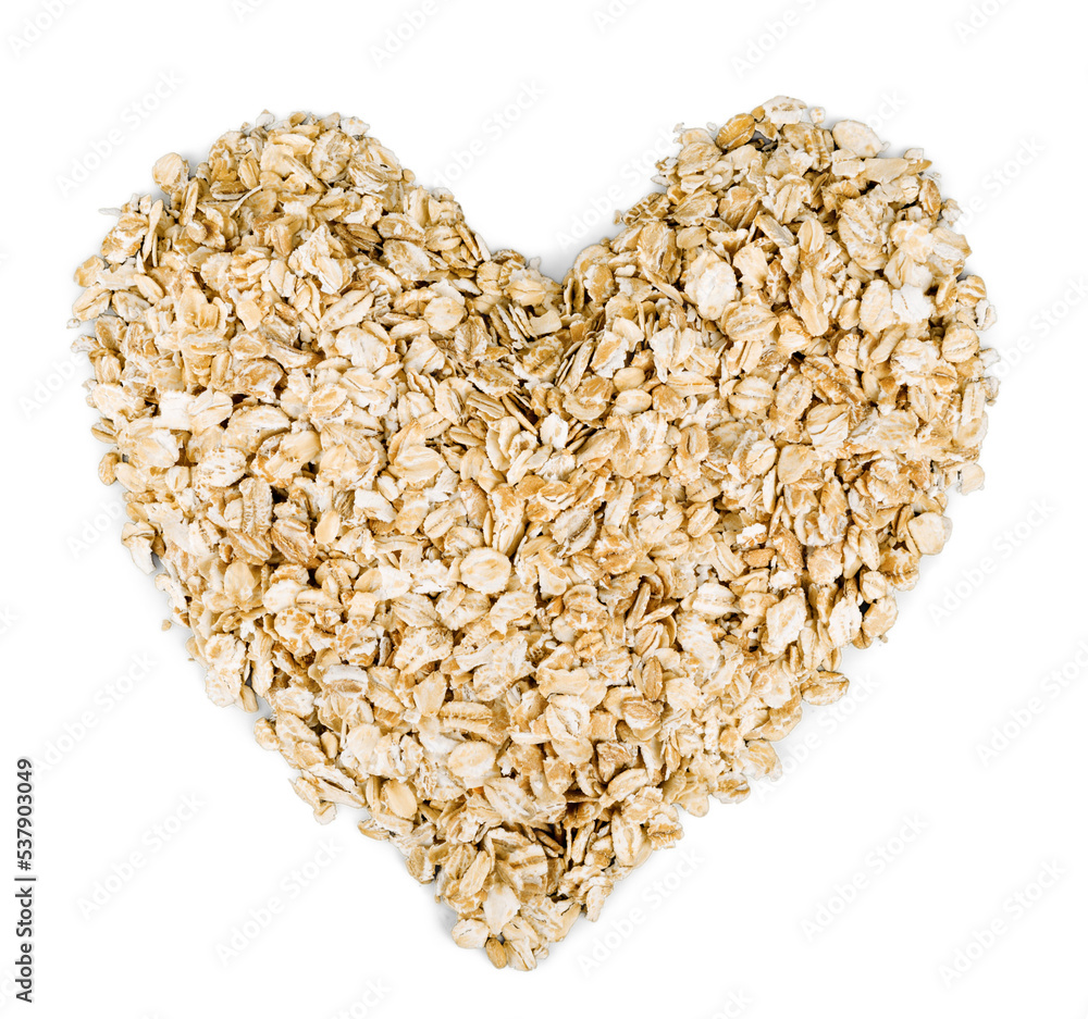 heap of oat flakes in a shape of heart shot from above heap of oat flakes in a shape of heart shot from above