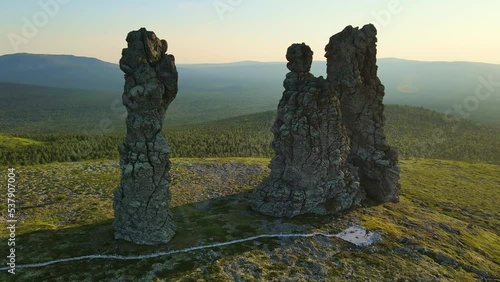 Aerial: Weathered stone pillars on the Manpupuner plateau. Tourist attraction photo