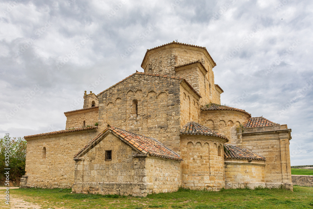 View of the Romanesque church of Nuestra Señora de La Anunciada, with a cloudy sky. Urueña, Valladolid, Castilla y Leon, Spain