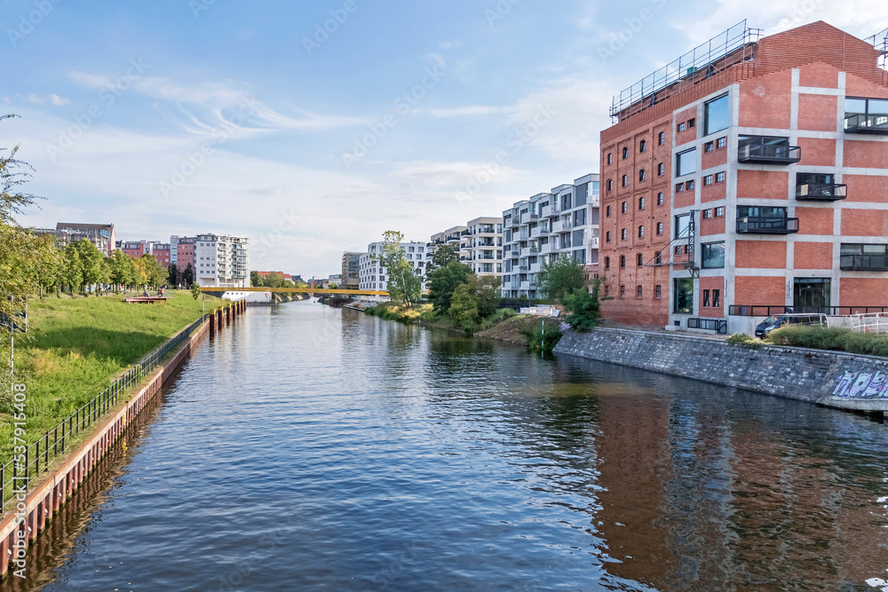 Naklejka premium Berlin-Spandau shipping canal and the the new Quarter at Nordhafen harbor in Berlin, Germany