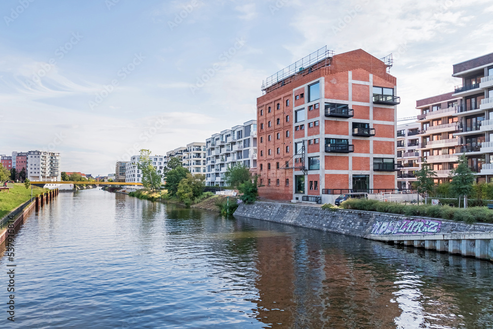 Berlin-Spandau shipping canal and the the new Quarter at Nordhafen harbor in Berlin, Germany