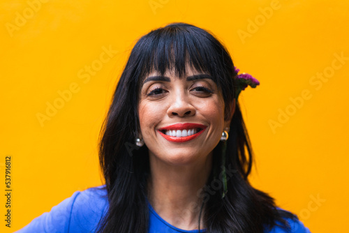 Woman Looking Happily At Camera  photo