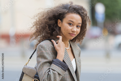 Portrait of business woman on street photo