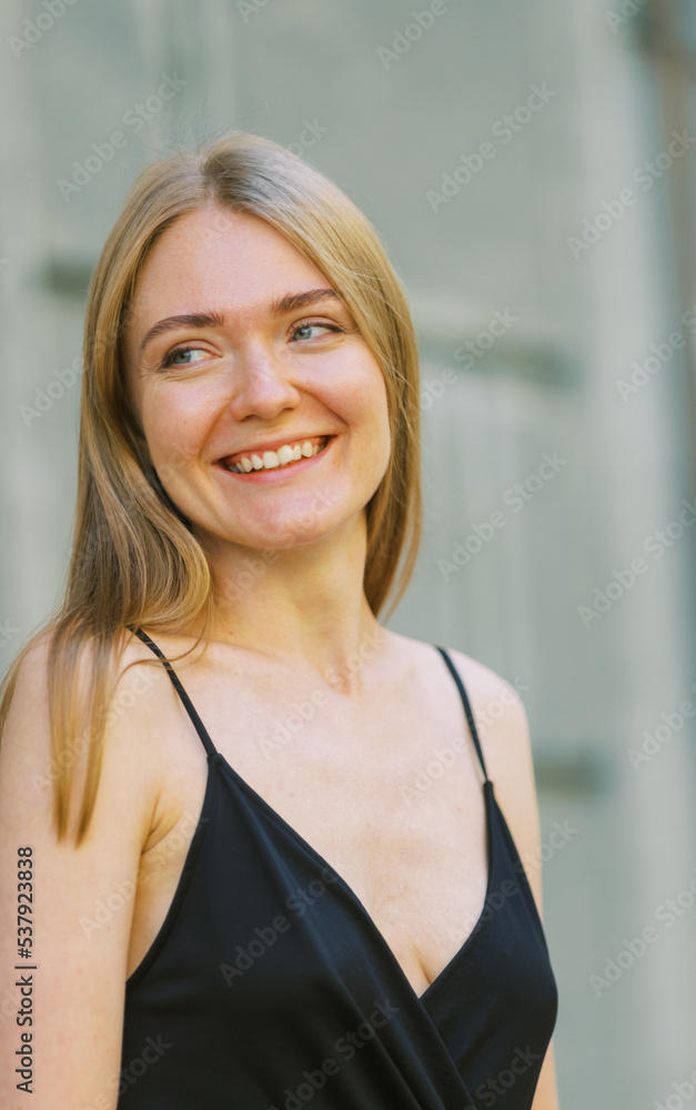 Happy young blond woman outdoors Happy young blond woman outdoors